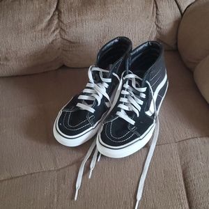 Black and white hightop vans
